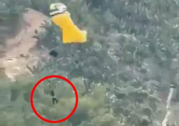 Horror moment tourist falls to her death in skydive tragedy after slipping out of her harness as she comes in to land