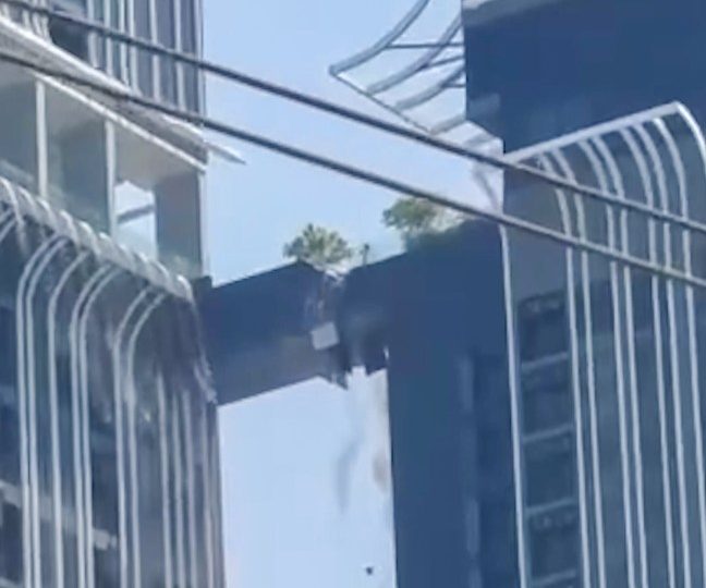 Watch hero dad leap from one crumbling skyscraper to another to save wife and daughter during horror Myanmar earthquake
