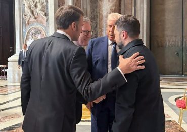 Lip reader reveals Trump’s five-word warning to Macron moments before mini-peace summit with Zelensky at Pope’s funeral
