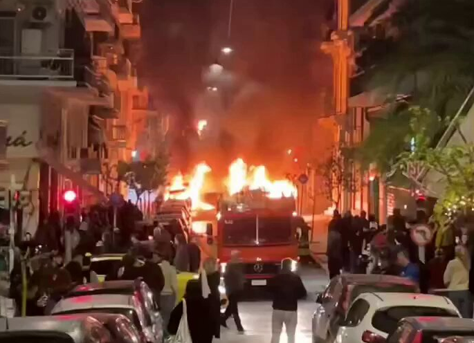 Shock vids shows Athens turned into WARZONE as petrol-bomb armed mob attack police with 21 cars torched & 72 arrested