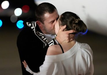 US ballerina Ksenia Karelina kisses boyfriend as she FINALLY returns home escaping 12-year prison sentence in Putin jail
