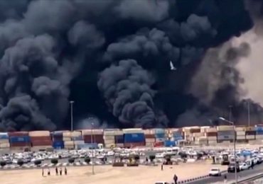 Horror moment huge explosion rips through port in Iran leaving at least 281 injured as black billowing smoke fills sky