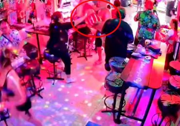 Moment swaggering tourist ‘grabs bar worker & hoists her over his head’ before he was knocked out by bouncer in Thailand