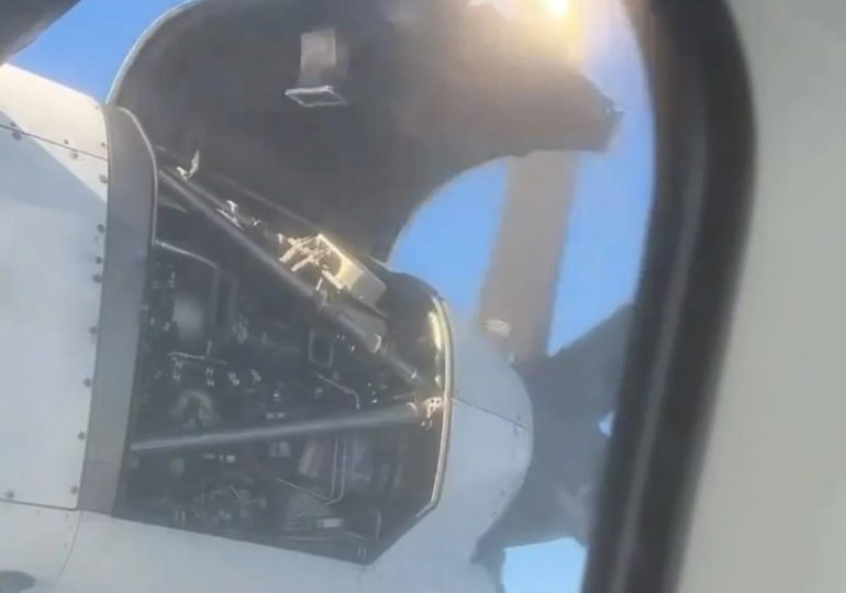 Horrifying moment plane engine panel comes off mid-air and begins to flap dangerously just inches from the propeller