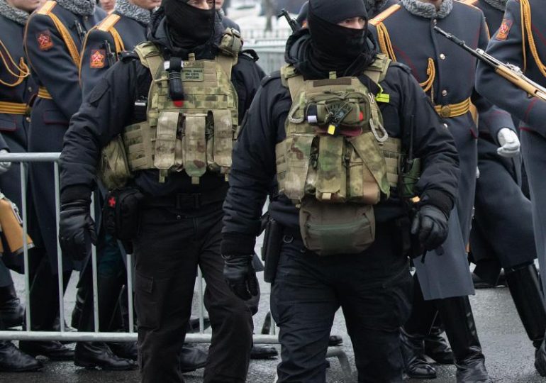 Is THIS what a Russian spy looks like? Intel agency releases handy guide on how to spot a Putin operative in your midst