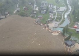 Swiss town BURIED after horror avalanche thunders down mountain in huge landslide & submerges homes & causes evacuation
