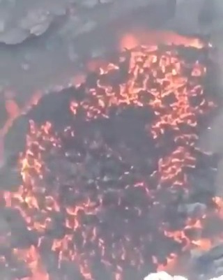 Watch moment idiot tourists climb into fiery mouth of active volcano Popocatépetl in death defying stunt