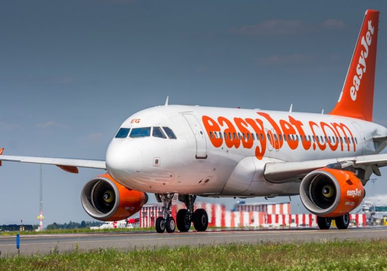 EasyJet flight chaos as passenger grabs plane door & screams ‘bomb’ on flight to Manchester forcing emergency landing