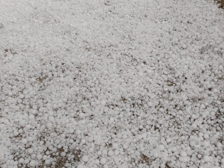 Watch as HAILSTORMS pummel hols hotspot Spain and turn streets white… while Britain bakes in hottest start to May