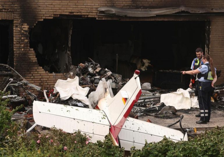 Two killed after small plane crashes into terraced house and bursts into flames in Germany