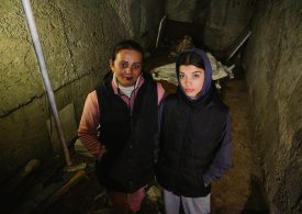 Inside Ukraine’s most bombed estate in town on Russian border where locals vow ‘we will live here and we will die here’