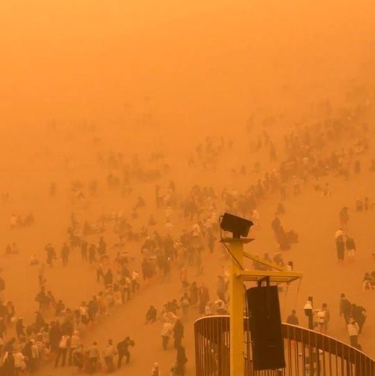 Terrifying moment apocalyptic SANDSTORM engulfs 10,000 tourists leaving air thick with orange dust sparking evacuations