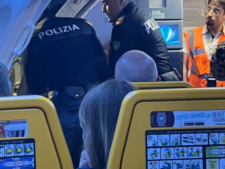 Moment Brit passenger is dragged off Ryanair flight to Corfu after ‘on-board brawl’ diverted plane 600 miles to Italy