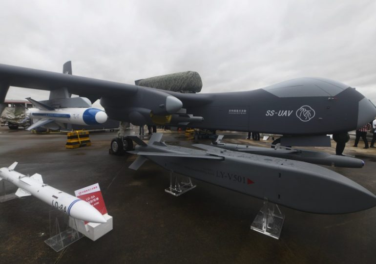 Watch terrifying vision of secret Chinese drone mothership that launches AI killer swarms – as it takes to skies in days