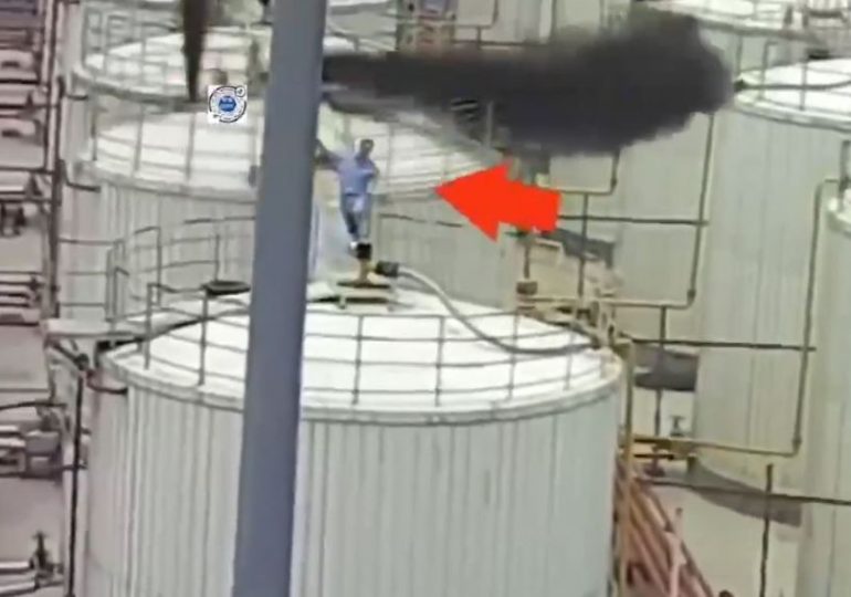 Watch moment worker runs for his life & dodges death by just inches as chemical tanks explode around him killing five