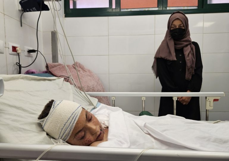 Nine children of a doctor among 79 people killed in Israeli air strike in Gaza