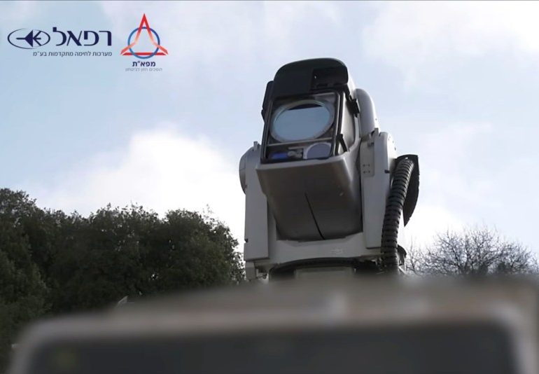 Watch jaw-dropping moment laser weapon is used for the first time EVER on the battlefield as kamikaze drone is blasted