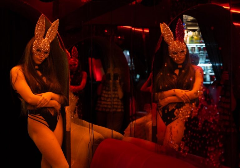 Inside the Ukrainian frontline strip club where brave dancers flout curfew to perform to punters enduring hell of war