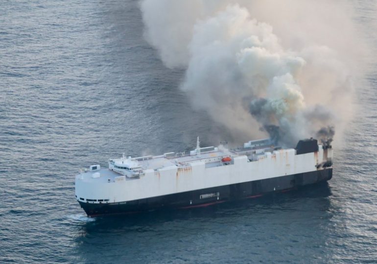 Watch giant flaming ghost ship continue to burn over a WEEK after blaze erupted on cargo vessel laden with electric cars