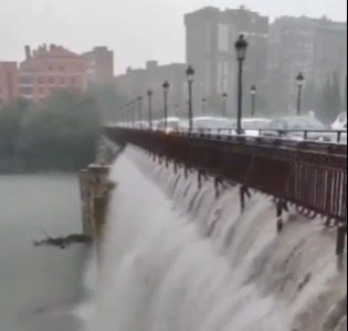 Spain swamped by floods as two-hour rain deluge leaves drivers trapped and streets underwater as emergency declared