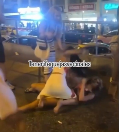 Shock moment two Brit women brawl on Tenerife street as leering yobs spur them on sparking local fury on holiday island