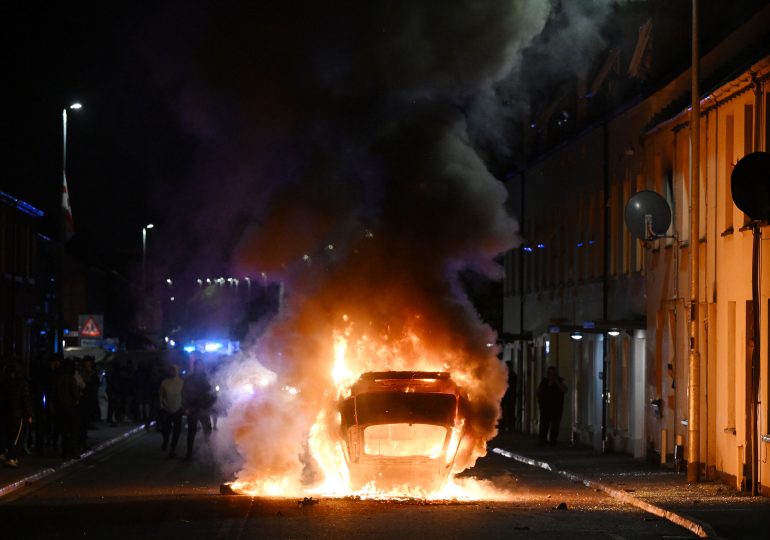 What to Know About the Northern Ireland Riots as Police Use Water Cannon Amid Petrol Bombs and Chaos