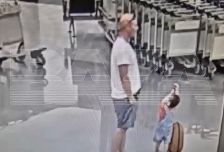 Horror moment stranger brute slams toddler into ground at airport while pregnant mum collected pram leaving him in coma