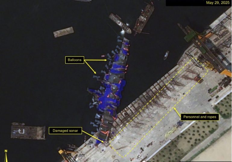 North Korea’s half-sunk warship hauled UPRIGHT with giant balloons as cause of disaster that humiliated Kim is revealed