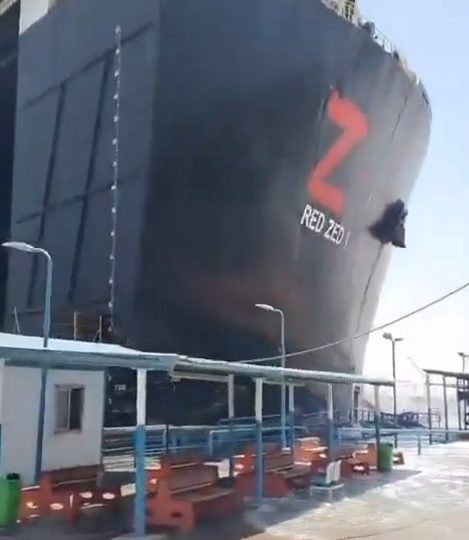 Terrifying moment out-of-control 700ft cargo ship CRASHES into Suez Canal port sending workers fleeing for their lives