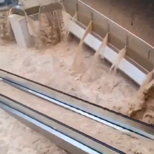 Shock moment floods swamp shopping centre turning escalators into waterfalls & washing cars into underground garages