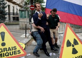 Greenpeace activists swipe Emmanuel Macron waxwork from Paris’s Grevin Museum before using it in anti-Russia protest
