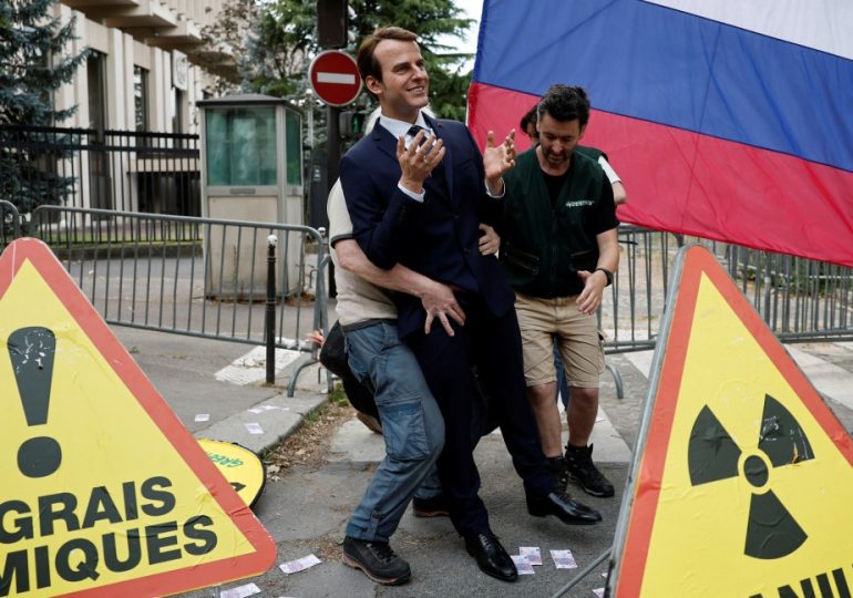 Greenpeace activists swipe Emmanuel Macron waxwork from Paris’s Grevin Museum before using it in anti-Russia protest