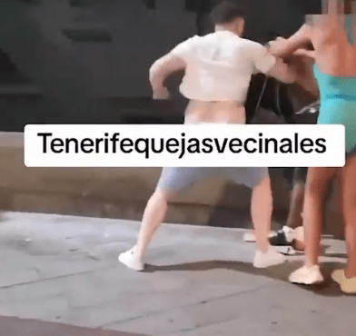 Shock moment cheering Brits watch vicious street brawl in hols hotspot Tenerife as screaming woman begs for them to stop