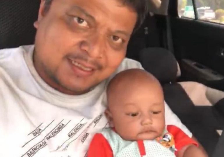 Tragic baby boy crushed to death after dad suffers fatal heart attack and collapses on top of him