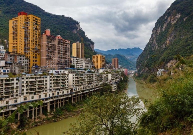 Inside world’s narrowest city home to 450,000 people who can shake hands across street – but ‘sit on edge of disaster’