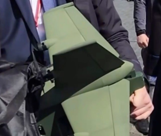 Watch as paranoid Putin is escorted by anti-drone rocket launcher on walkabout after fearful despot cancelled ‘Navy Day’