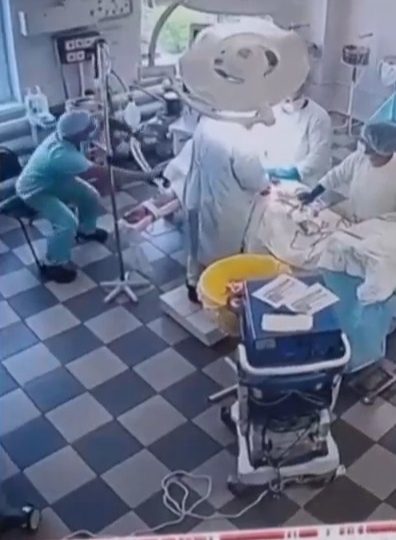Nerve-wracking moment doctors continue performing cancer surgery on patient during monster 8.8-mag earthquake