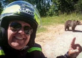 Haunting final selfie of tragic biker tourist mauled to death by brown bear after taking smiling pic and vid