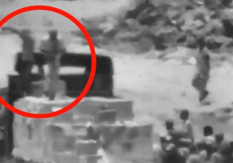 Shock moment gun-toting terrorists loot Gaza aid truck as 22 Arab states urge Hamas to SURRENDER in unprecedented plea