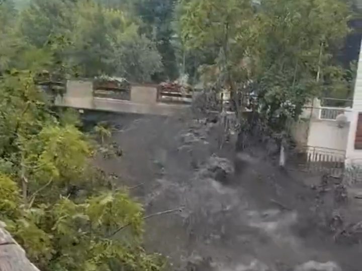 Terrifying vids show flash floods surging through Italian towns leaving at least one dead & dozens trapped after storm