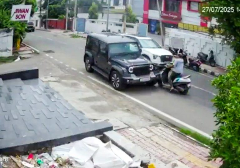 Horrifying moment ‘rich kid’ driver knocks over scooter rider & then reverses 4×4 truck into him in road rage