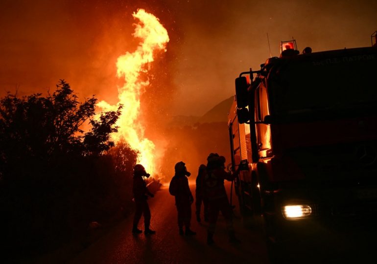Huge wildfires spread across Brit tourist hotspots with hotels evacuated ‘by the minute’ as holidaymakers flee resorts
