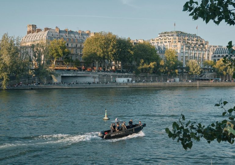 Mystery as bodies of FOUR men are pulled from Seine in Paris after train passenger spotted floating corpse