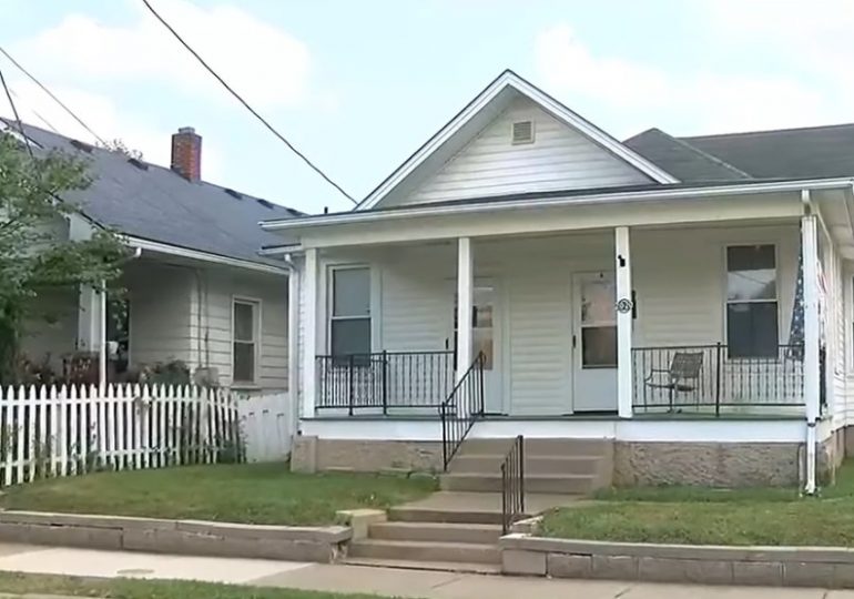 Horror as body of pregnant woman discovered in plastic storage bin dumped on side of road as two men arrested