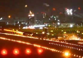 Terrifying moment Boeing 747 wing smashes into runway during typhoon landing sending sparks flying