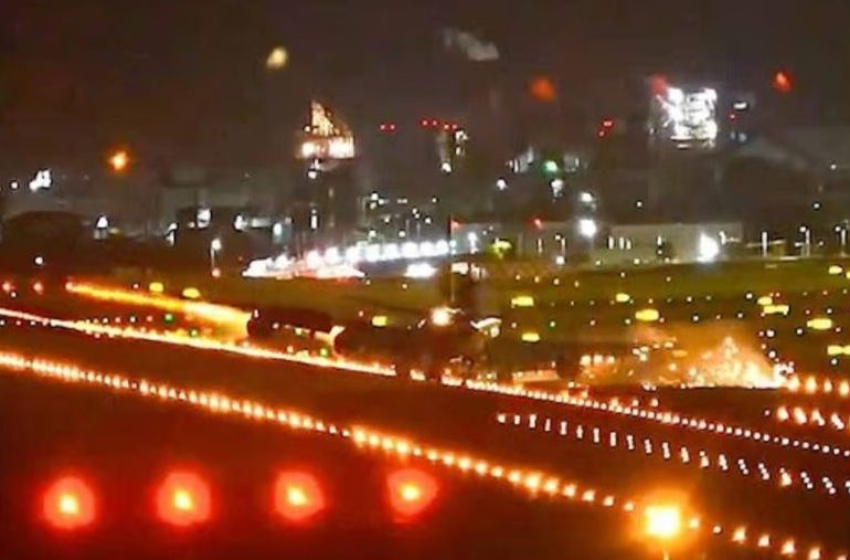 Terrifying moment Boeing 747 wing smashes into runway during typhoon landing sending sparks flying