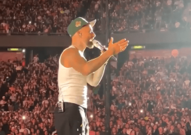 Moment rapper stops concert to 26,000 fans to berate ‘irresponsible’ mum who brought her one-year-old BABY to gig