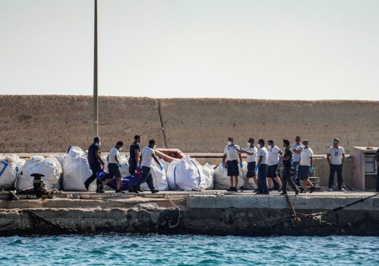 At least 26 dead and a dozen missing after boat capsizes near Italian island