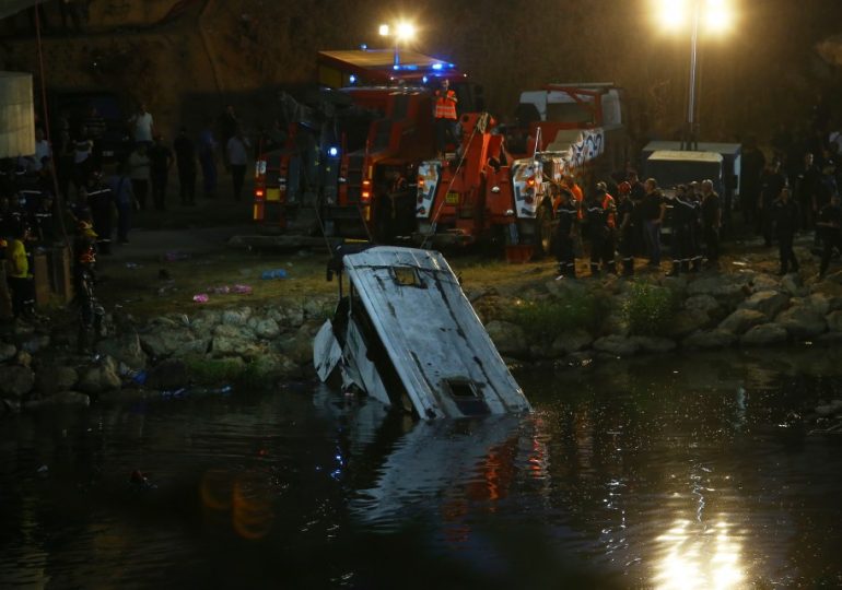 At least 18 dead and nine injured after bus plunges from bridge into a river after veering off the road in Algeria