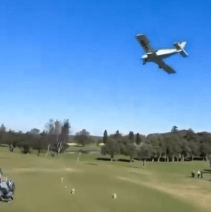 Horror moment plane CRASHES on golf course injuring two as golfers rush to help pilot instructor & student on board